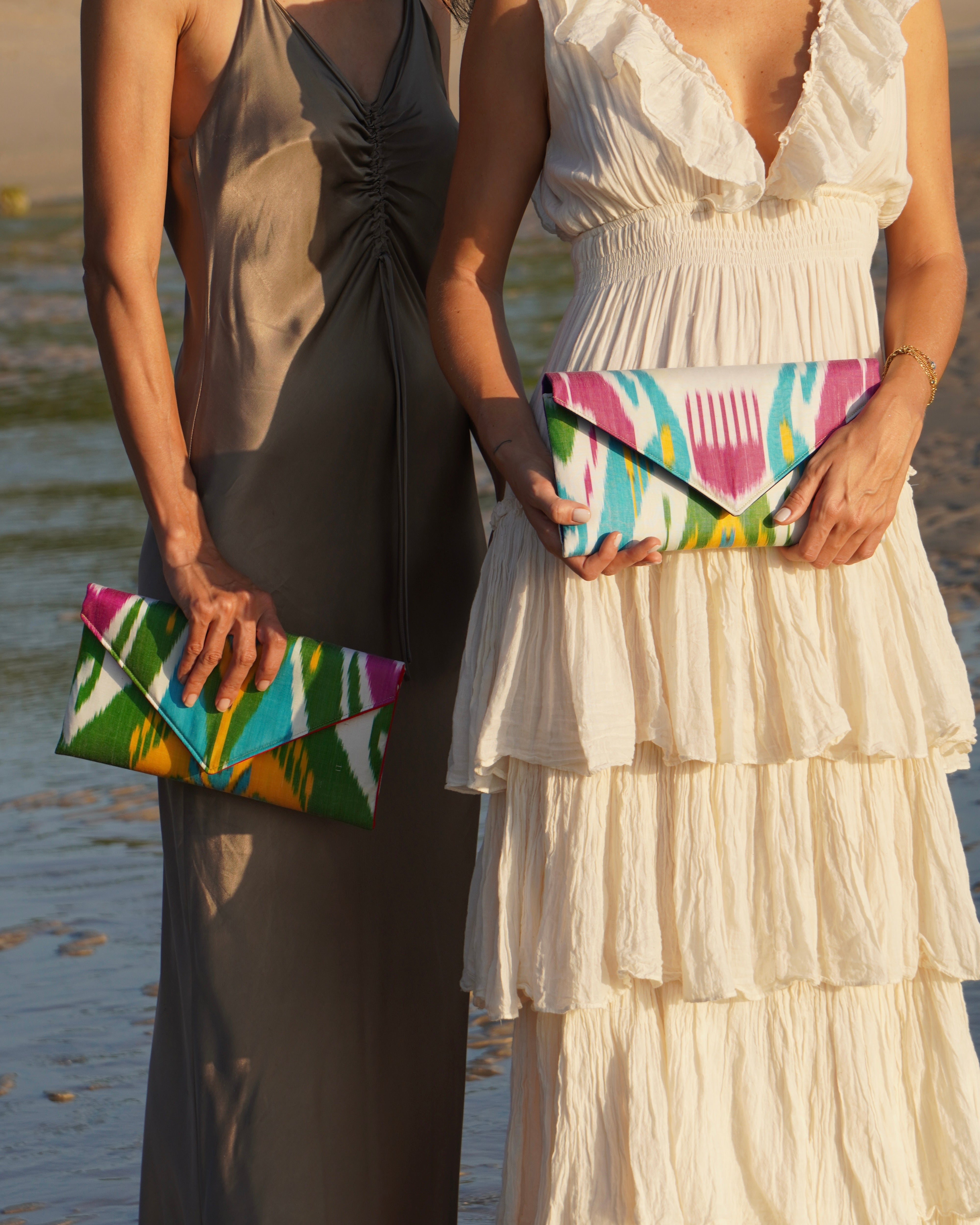 Handwoven silk ikat patterns captured on two classic Frankitas envelope clutches