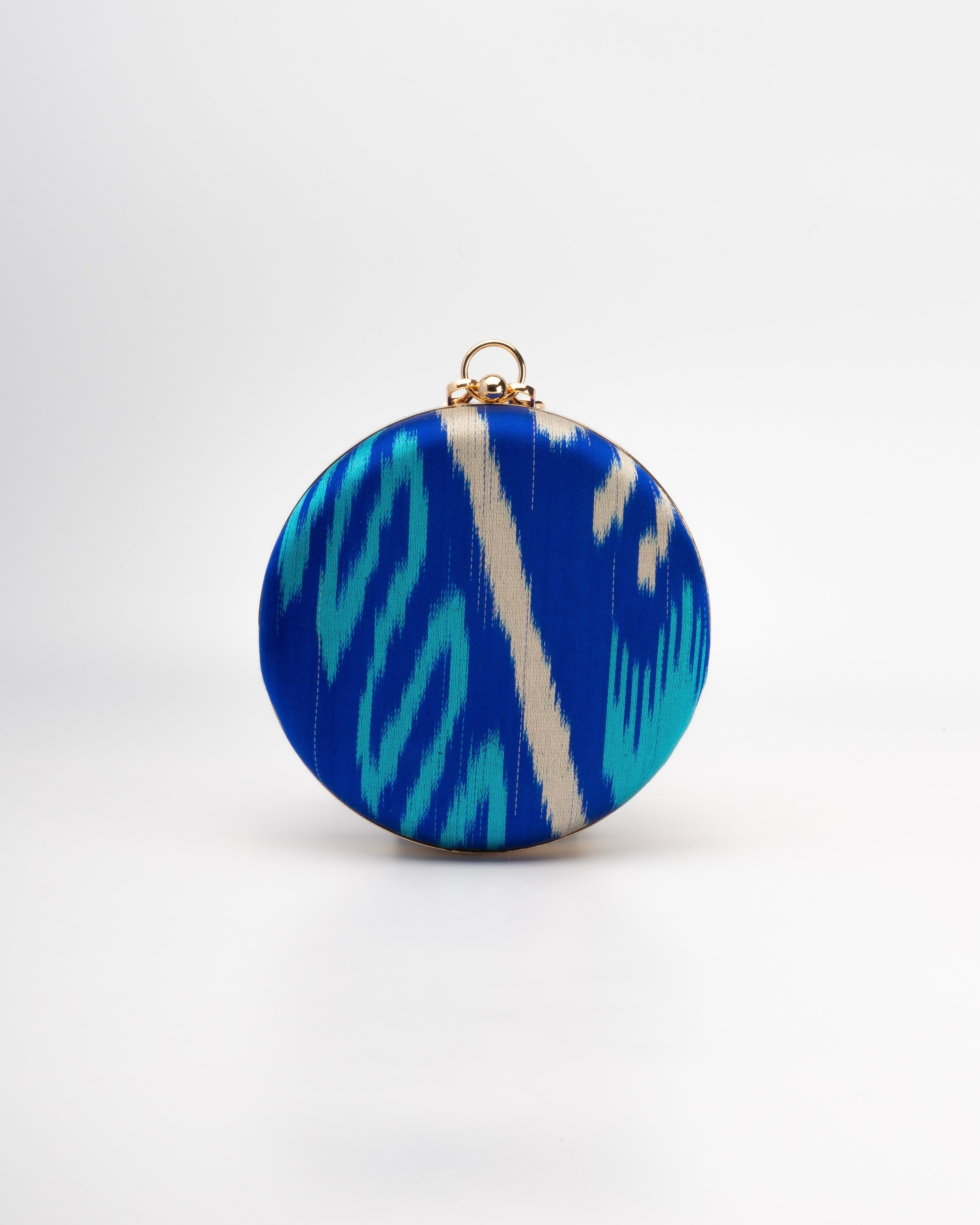 Close-up of a luxury artisan Frankitas handwoven Asian Heritage in textiles - Silk Ikat in blue and turquoise