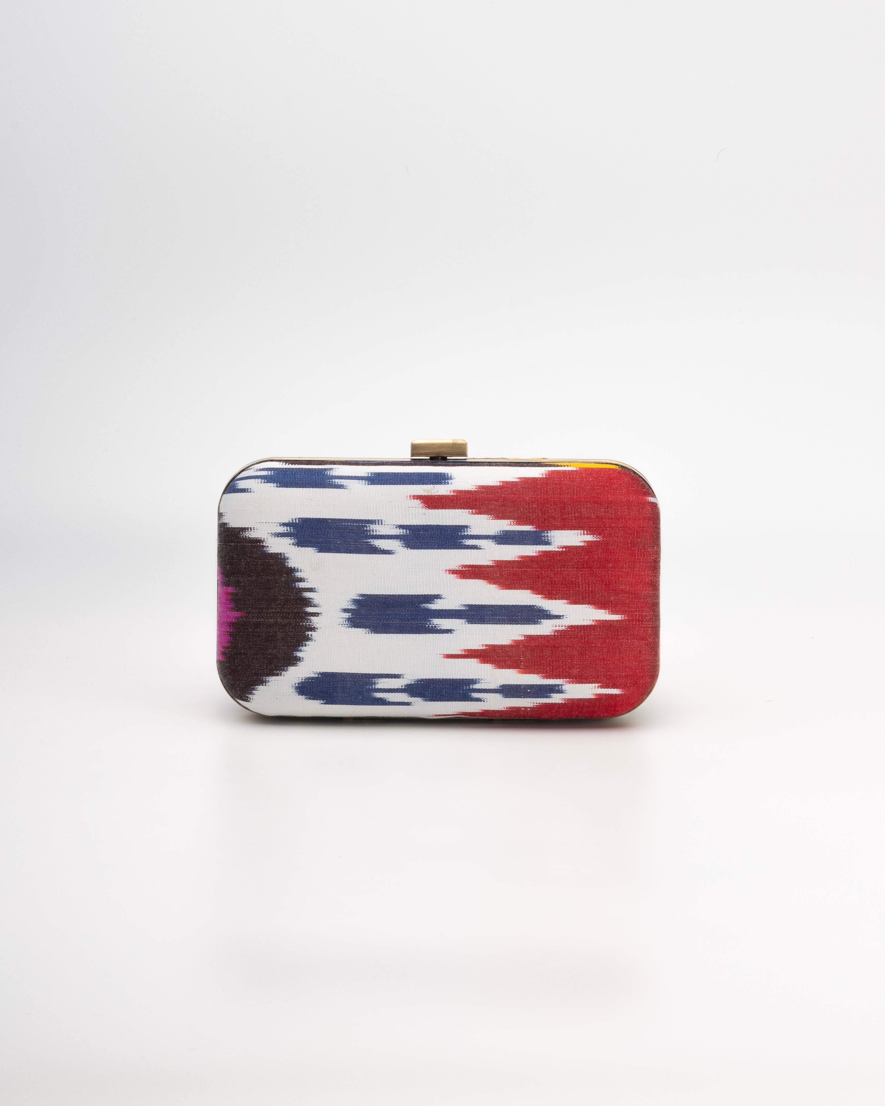 Frankitas rectangular clutch handcrafted in multicolour Silk Ikat with heritage Asian-inspired patterns