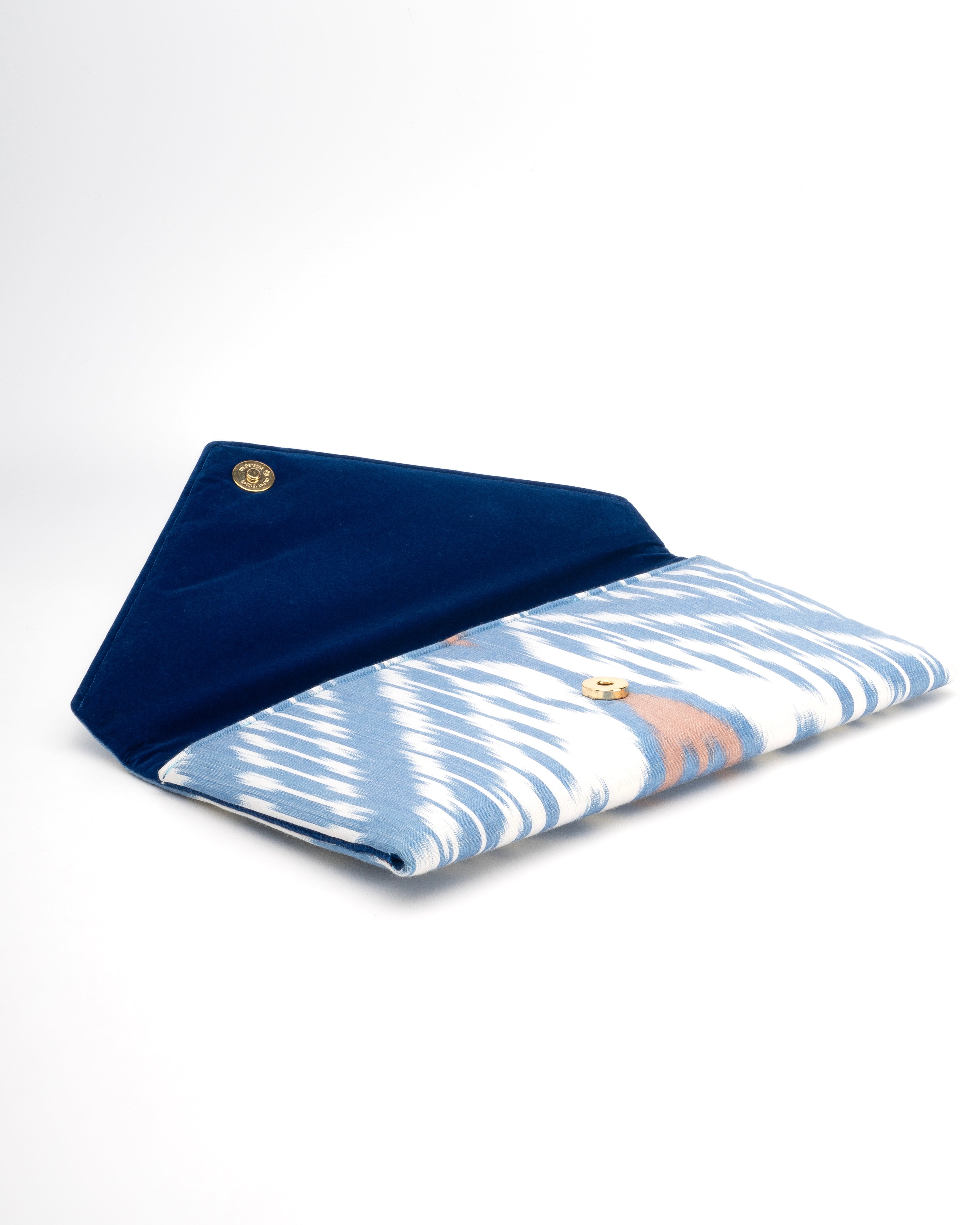 Hand‑loomed light blue and white handwoven silk Ikat envelope clutch by Frankitas