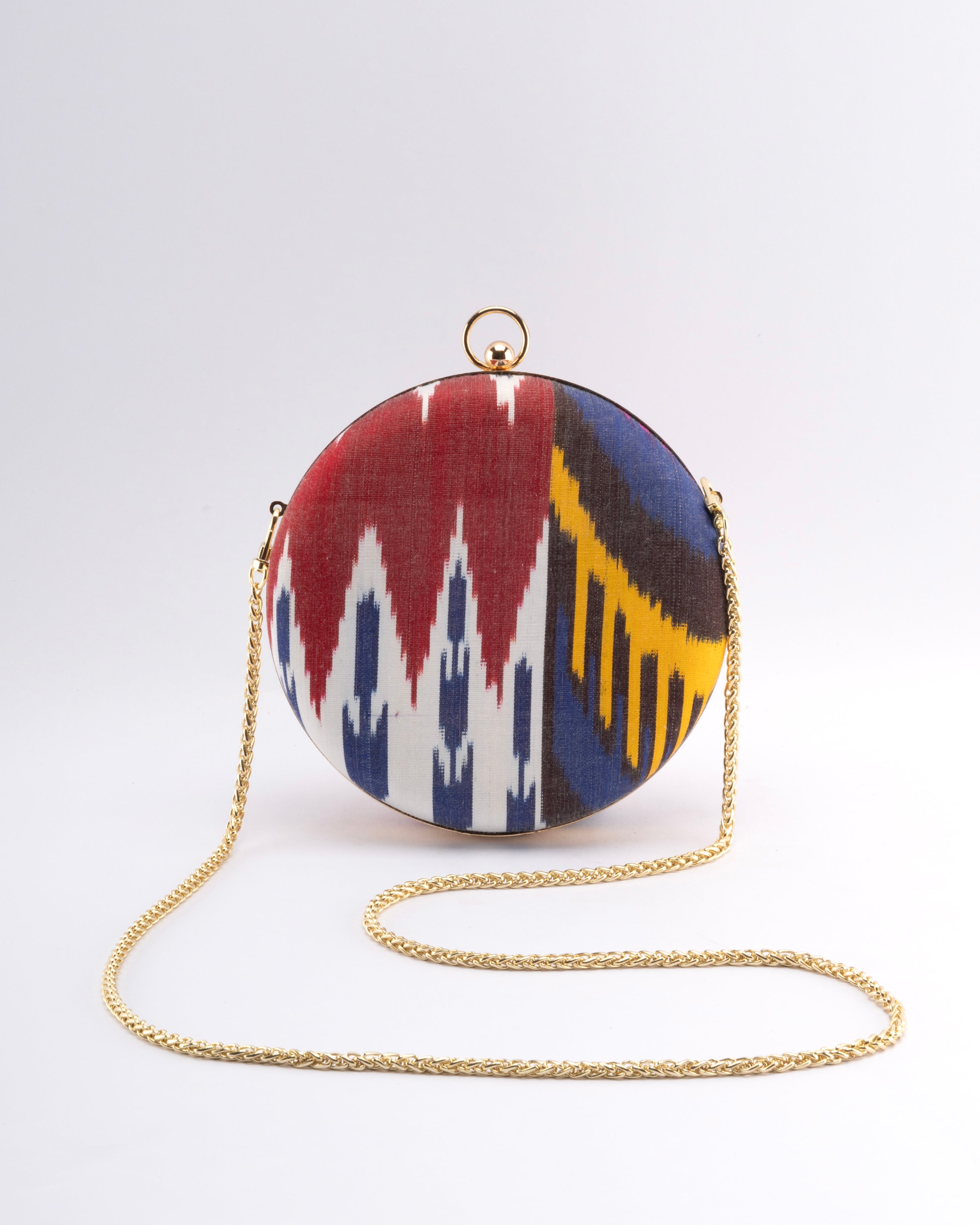 Vibrant silk ikat weaving defines Frankitas' Puteri Round clutch, a hallmark of our signature collection.