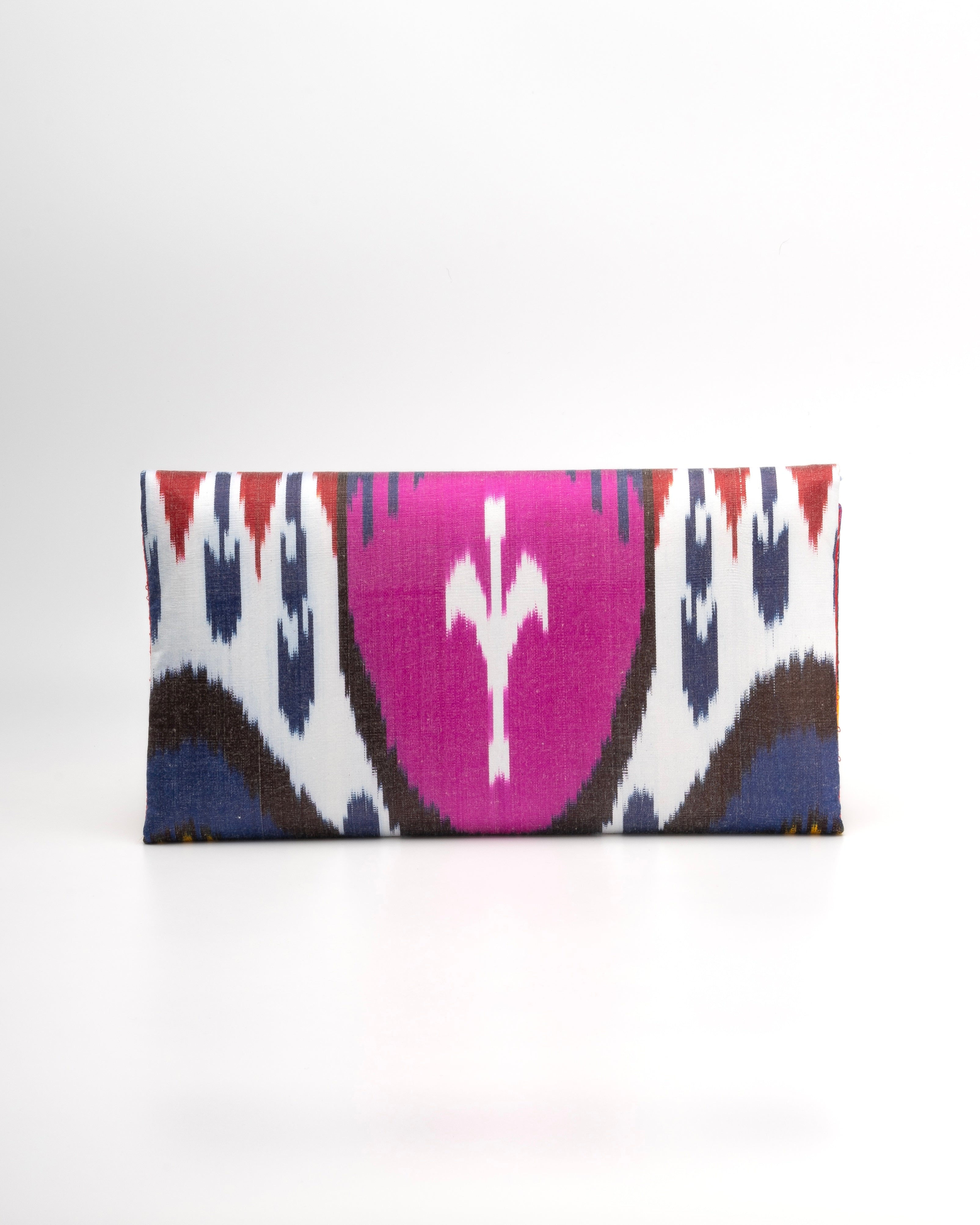 More  than an accessory; it’s a wearable story of culture, craftsmanship, and modern sophistication - Frankitas Titin clutch bag