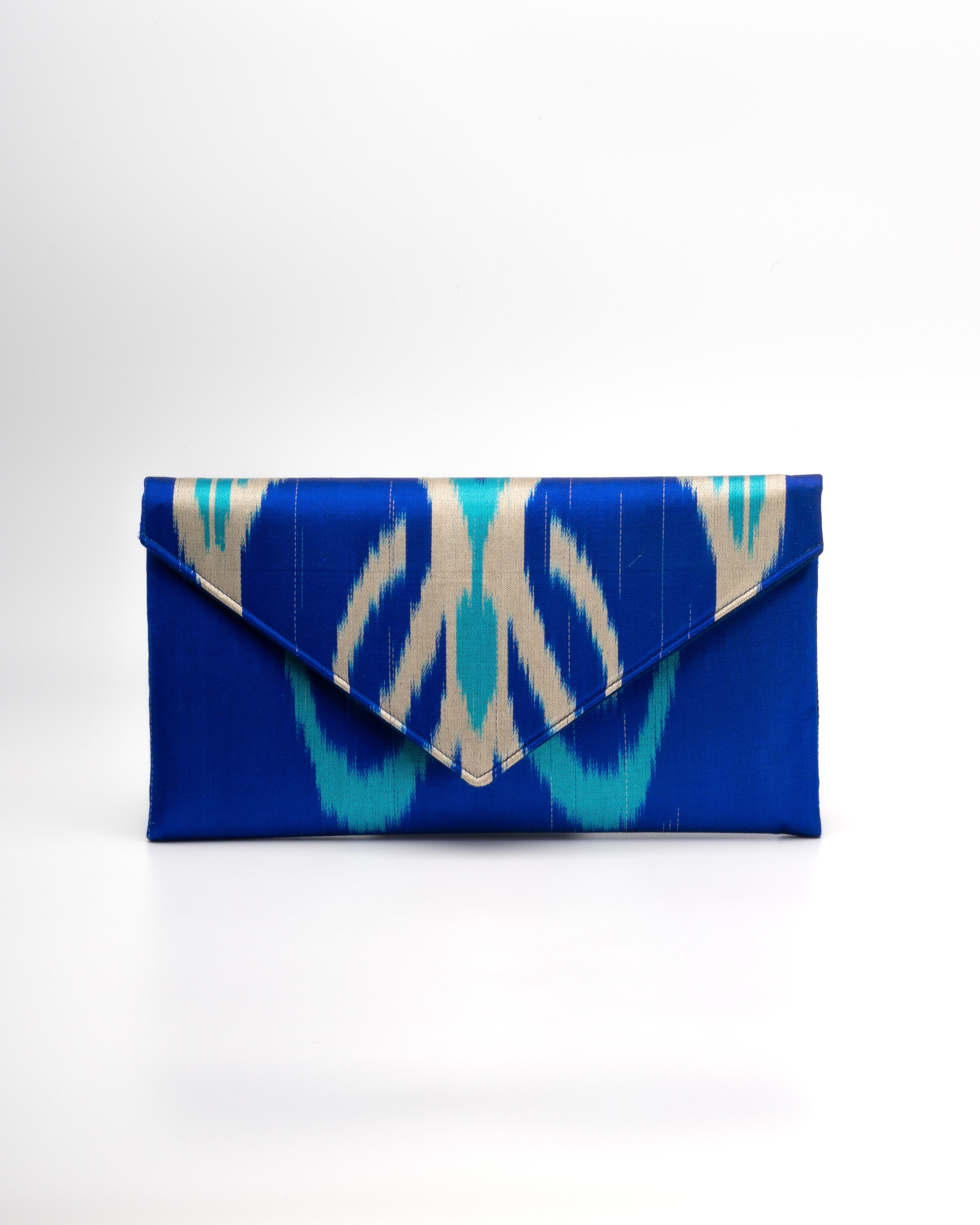 Stunning bright and classic Blue and beige patterned silk ikat handwoven clutch bag by Frankitas 