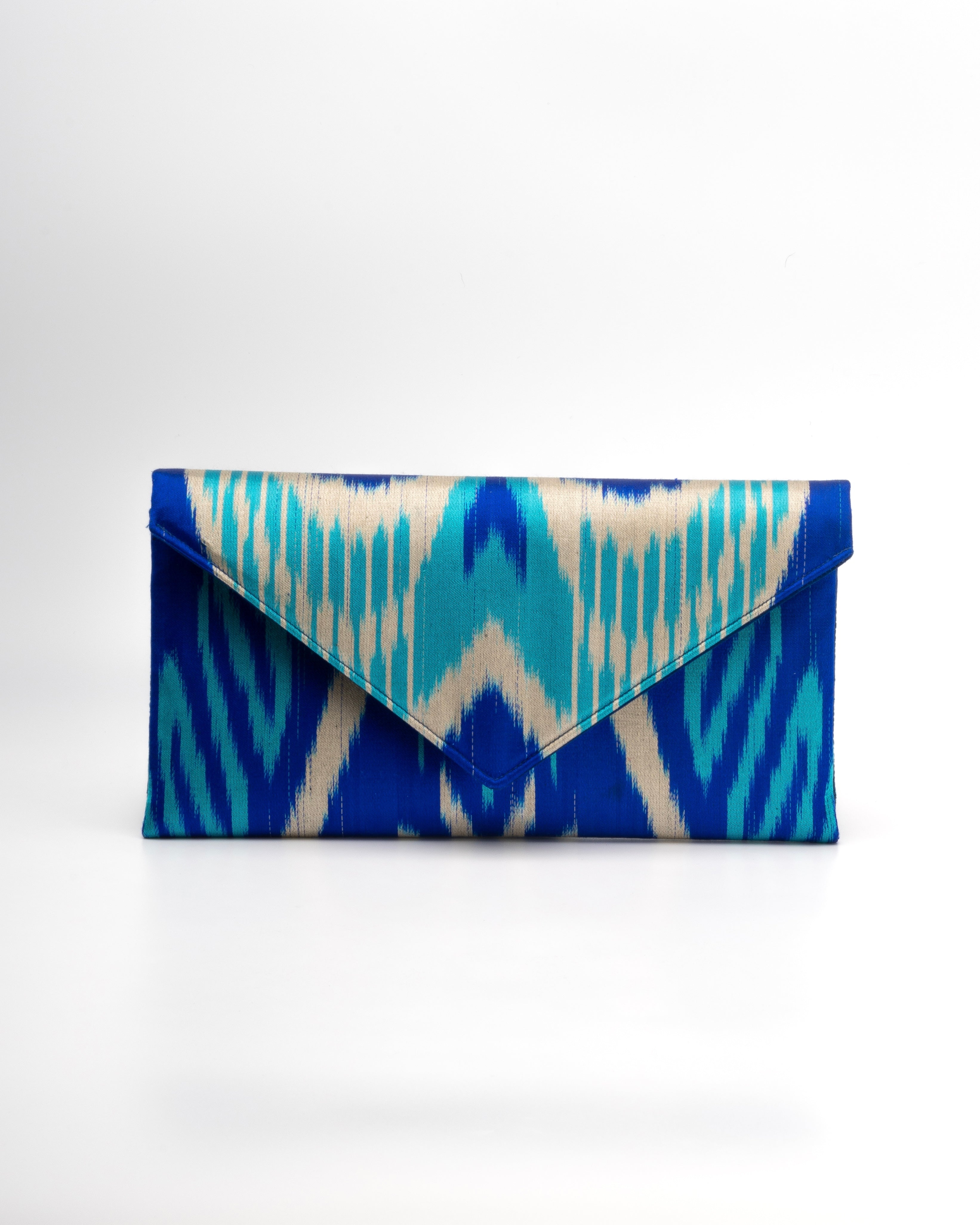 The vibrant beauty of deep blue and turquoise with beige patterns handwoven by artisans in Central Asia and celebrated by Frankitas 