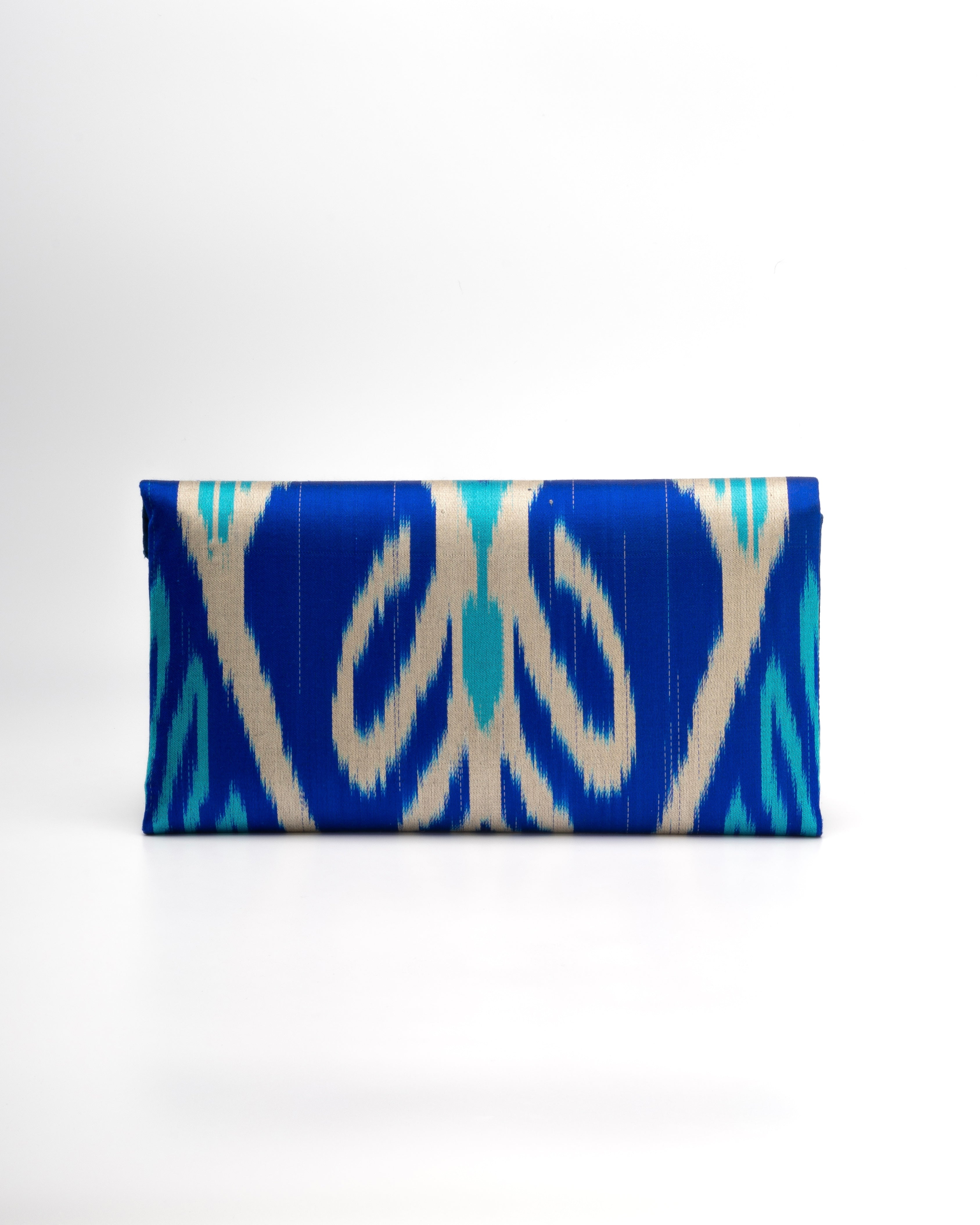 Blue and turquoise silk Ikat envelope clutch, heritage weaving with modern style—by Frankitas
