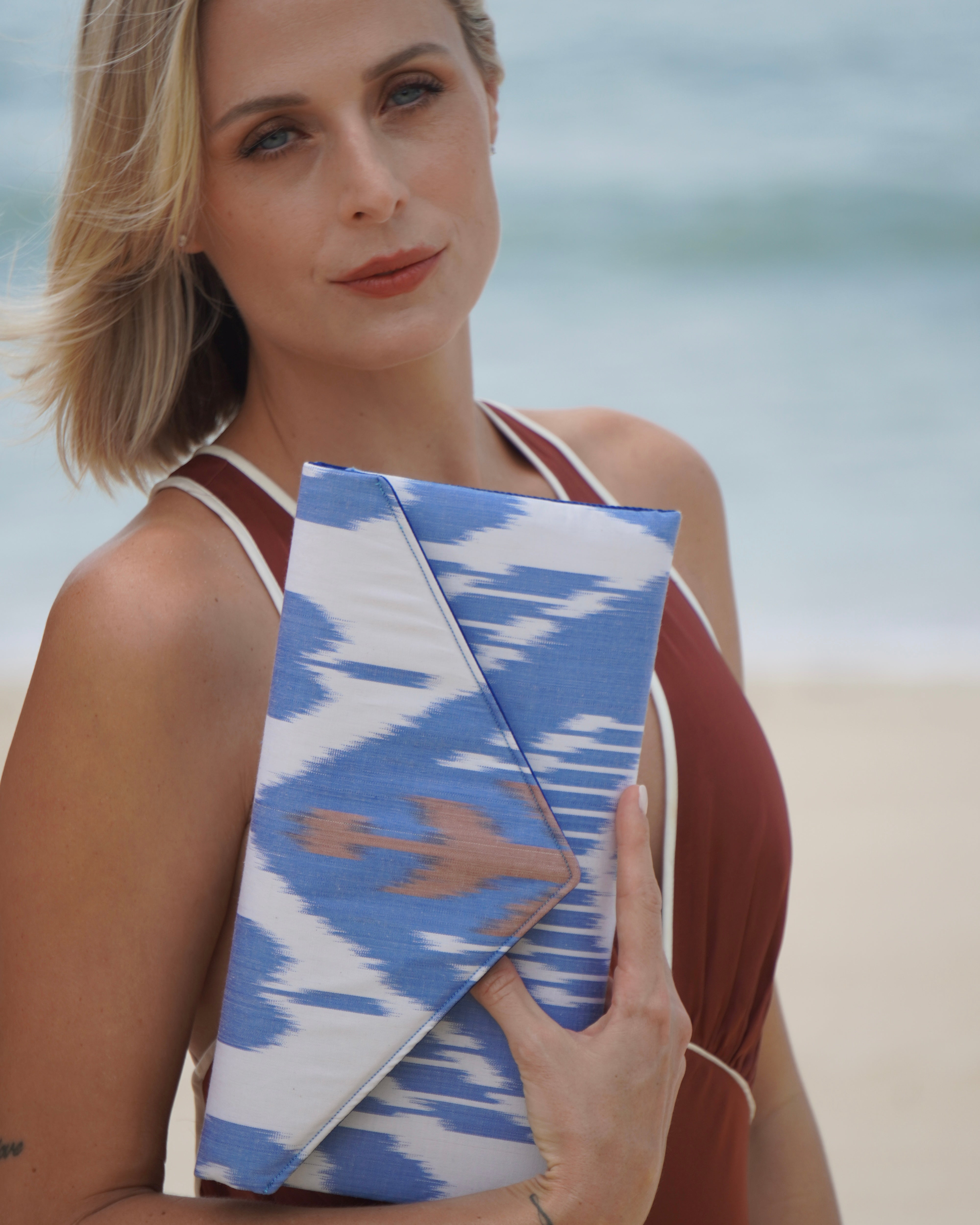 Artisan handwoven silk clutch handbag with Ikat motif design honored by Frankitas  